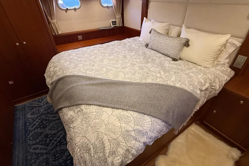 Slide: The Image of Luxurious bedroom interior of 2021 Elling E6 yacht with elegant bedding and decor. - 60