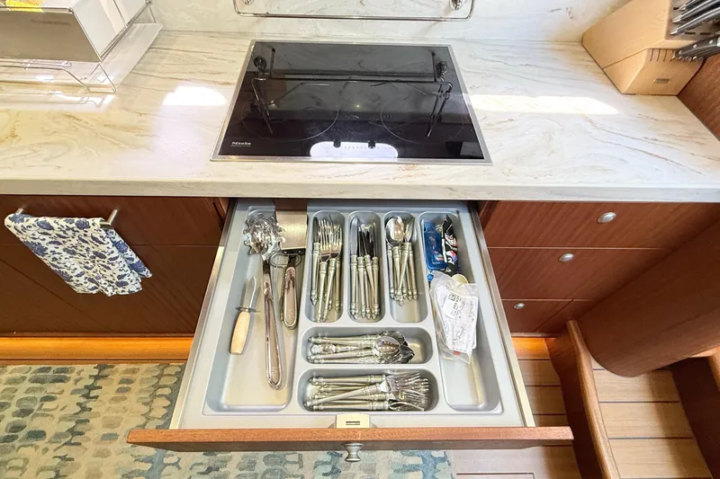 Slide: The Image of Kitchen drawer with organized cutlery in an Elling E6 yacht, 2021 model. - 46