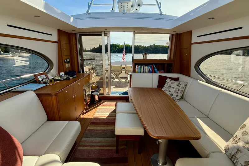 Slide: The Image of Luxurious interior of 2021 Elling E6 yacht with elegant seating and scenic water view. - 24