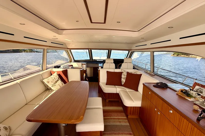 Slide: The Image of Luxurious interior of 2021 Elling E6 yacht with elegant seating and panoramic windows. - 17