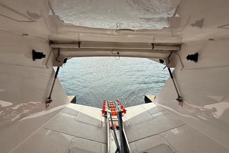 Slide: The Image of 2021 Elling E6 yacht interior with open hatch and view of water. - 93