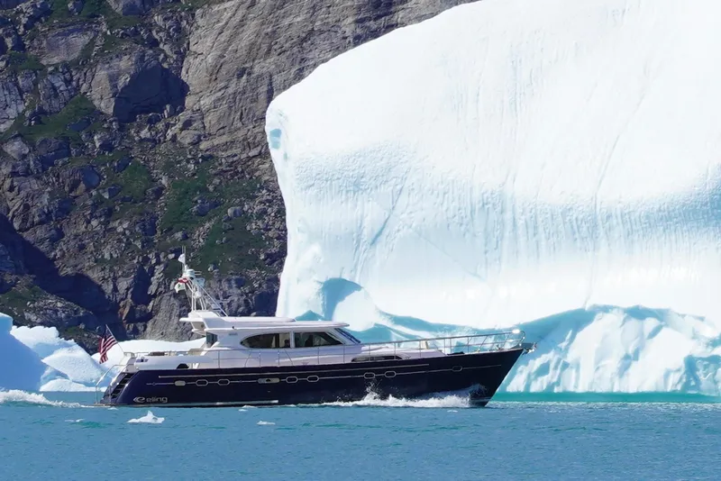The Image of Elling E6 yacht cruising near a massive iceberg, 2021 model. - 0