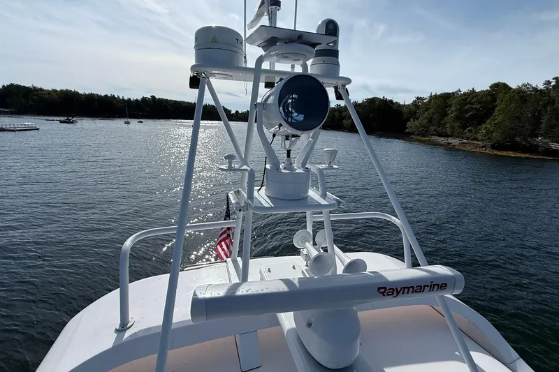 Slide: The Image of 2021 Elling E6 yacht with Raymarine equipment on a scenic waterway. - 111