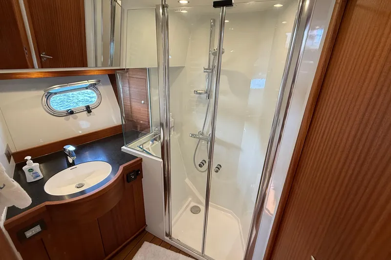 Slide: The Image of Luxurious bathroom in 2021 Elling E6 yacht with shower and sink. - 81
