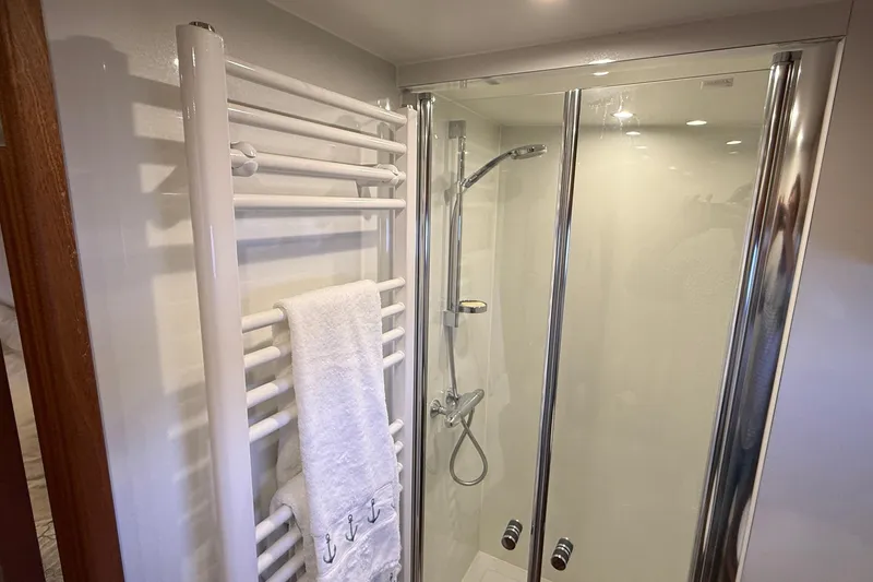 Slide: The Image of Modern bathroom in 2021 Elling E6 yacht with shower and towel rack. - 65