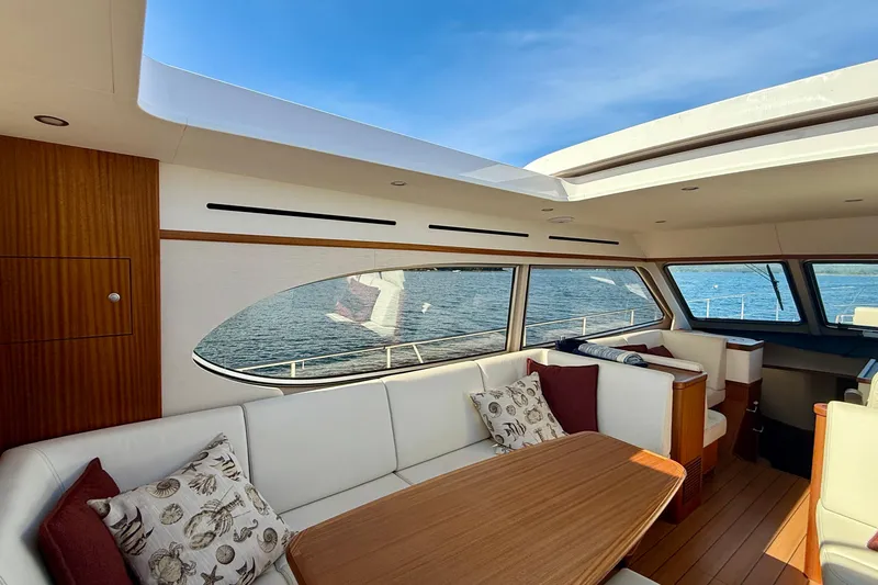 Slide: The Image of Luxurious interior of 2021 Elling E6 yacht with ocean view through large windows. - 22