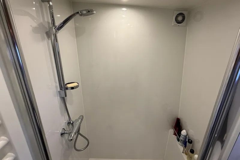 Slide: The Image of Modern shower in 2021 Elling E6 yacht bathroom with chrome fixtures. - 66