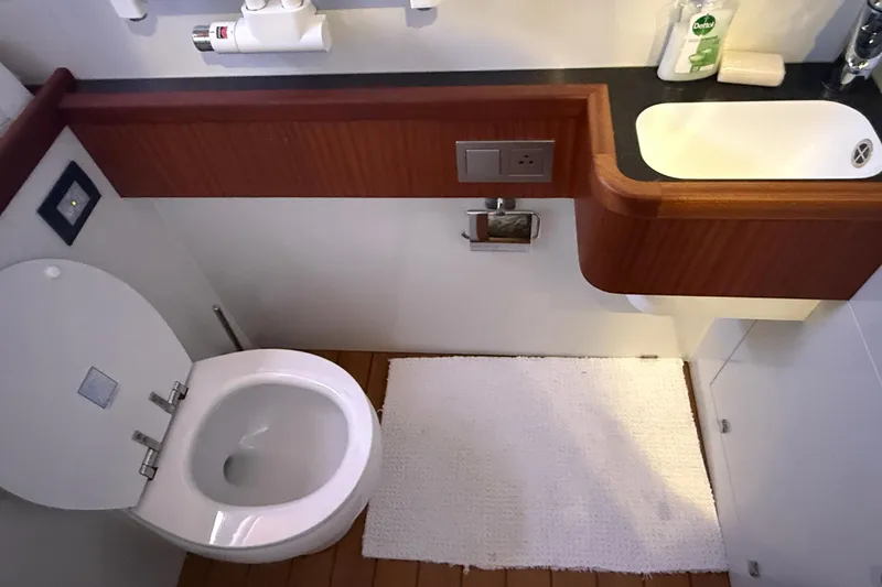 Slide: The Image of Elling E6 2021 yacht bathroom with modern fixtures and wooden accents. - 40