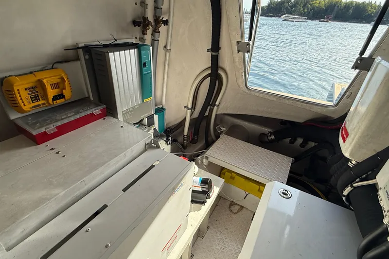 Slide: The Image of Interior of 2021 Elling E6 boat with equipment and scenic water view. - 90
