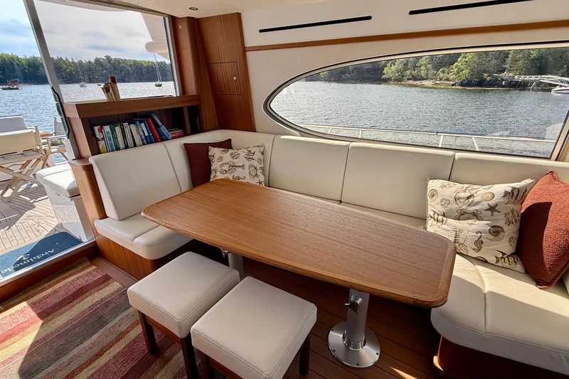 Slide: The Image of Luxurious interior of 2021 Elling E6 yacht with elegant seating and scenic water view. - 19