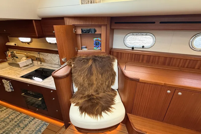 Slide: The Image of Luxurious interior of 2021 Elling E6 yacht with elegant wood finish and modern kitchen. - 43