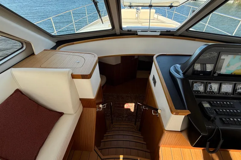 Slide: The Image of Interior view of 2021 Elling E6 yacht cockpit with navigation controls and seating. - 31