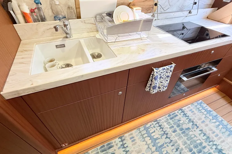 Slide: The Image of Modern kitchen in 2021 Elling E6 yacht with marble countertop and dual sink. - 50