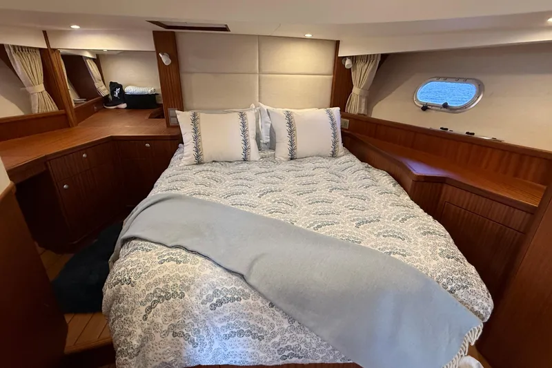 Slide: The Image of Luxurious 2021 Elling E6 yacht cabin with cozy bed and elegant wood finish. - 76