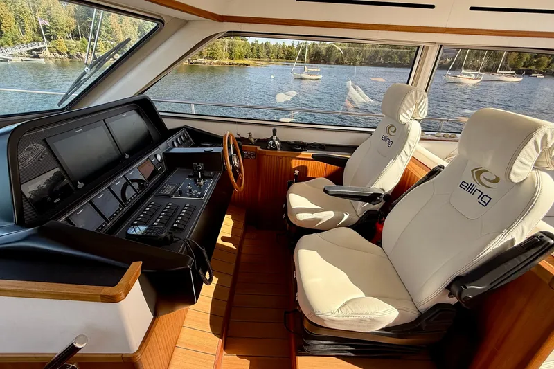 Slide: The Image of Pilothouse of 2021 Elling E6 yacht with modern controls and luxurious seating. - 27