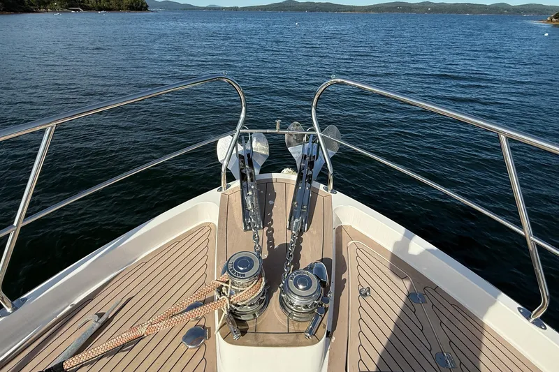 Slide: The Image of Bow of 2021 Elling E6 yacht with anchor and scenic ocean view. - 108