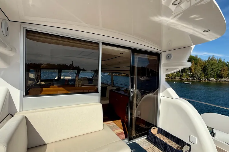 Slide: The Image of Luxury 2021 Elling E6 yacht interior with scenic water and forest view. - 82
