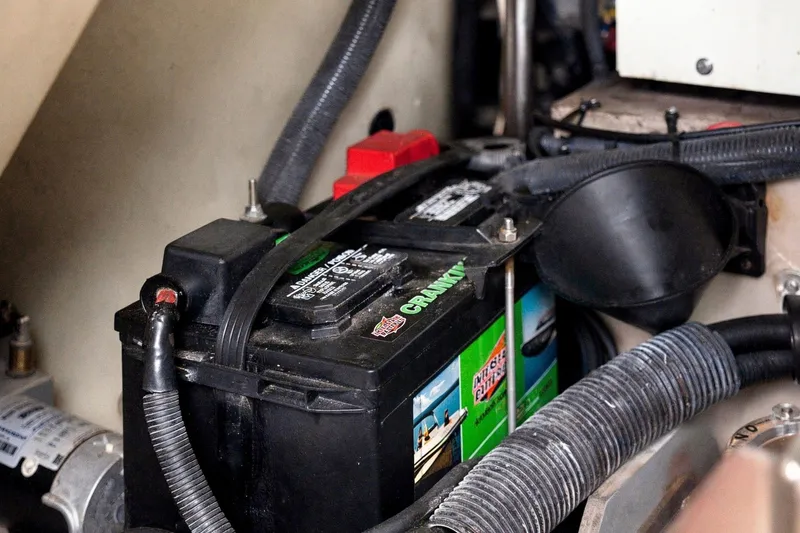 Slide: The Image of Battery compartment of a 2003 Sea Ray 450 Express Bridge boat. - 93
