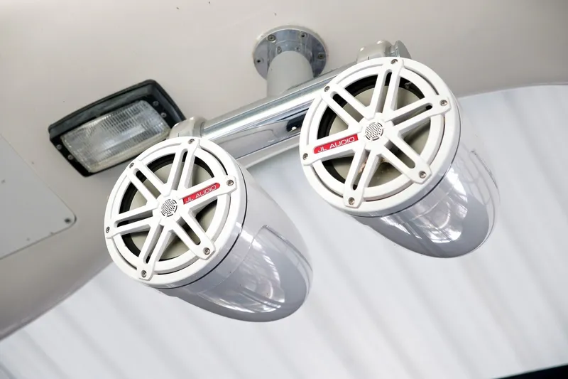Slide: The Image of JL Audio speakers on a 2003 Sea Ray 450 Express Bridge yacht. - 27