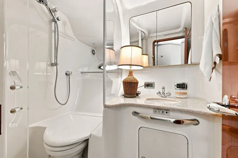 Slide: The Image of Luxurious bathroom in 2003 Sea Ray 450 Express Bridge yacht with modern fixtures. - 64