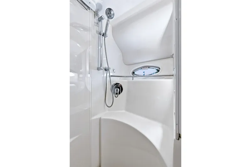 Slide: The Image of Shower area in 2003 Sea Ray 450 Express Bridge yacht, featuring sleek design and chrome fixtures. - 69