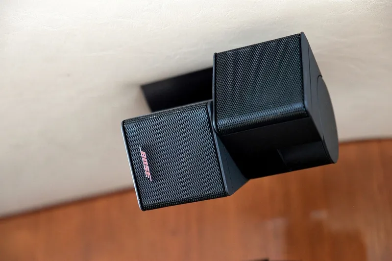 Slide: The Image of Bose speakers installed on a 2003 Sea Ray 450 Express Bridge yacht interior. - 50