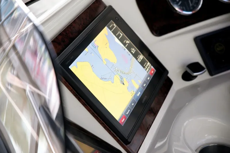 Slide: The Image of Navigation system on 2003 Sea Ray 450 Express Bridge yacht dashboard. - 37