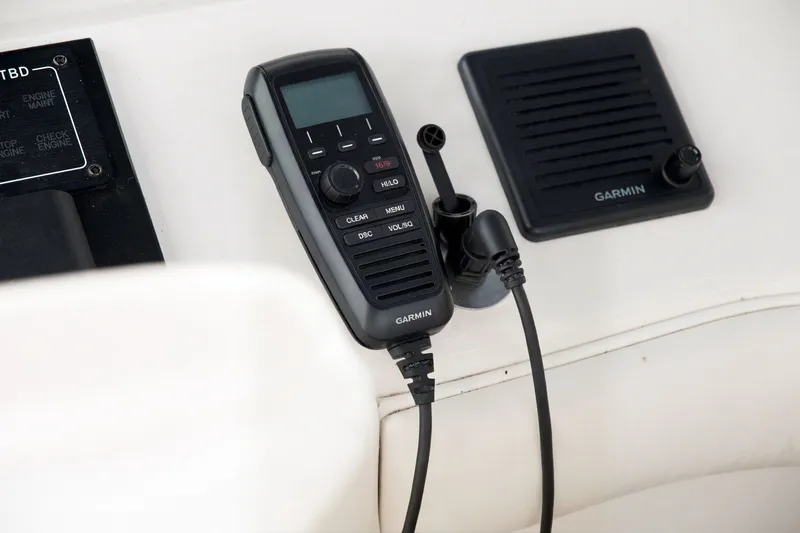 Slide: The Image of Garmin marine radio and speaker on 2003 Sea Ray 450 Express Bridge. - 30