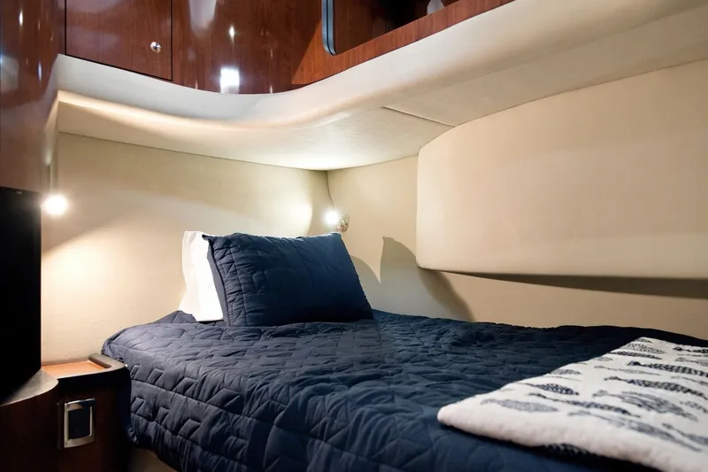 Slide: The Image of Luxurious cabin interior of 2003 Sea Ray 450 Express Bridge yacht. - 66