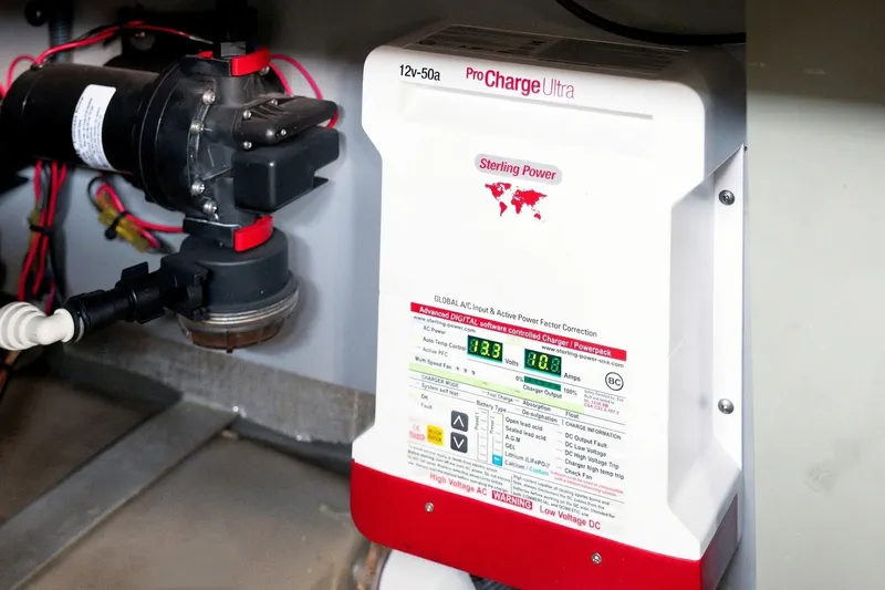Slide: The Image of Sterling Power ProCharge Ultra battery charger in 2003 Sea Ray 450 Express Bridge. - 80
