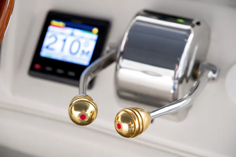 Slide: The Image of Throttle controls and display on a 2003 Sea Ray 450 Express Bridge yacht. - 39