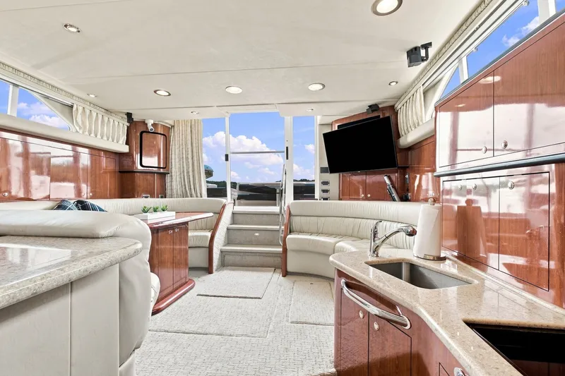 Slide: The Image of Luxurious interior of 2003 Sea Ray 450 Express Bridge yacht with elegant furnishings. - 42