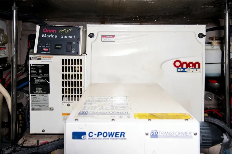Slide: The Image of Onan marine generator in 2003 Sea Ray 450 Express Bridge engine room. - 78