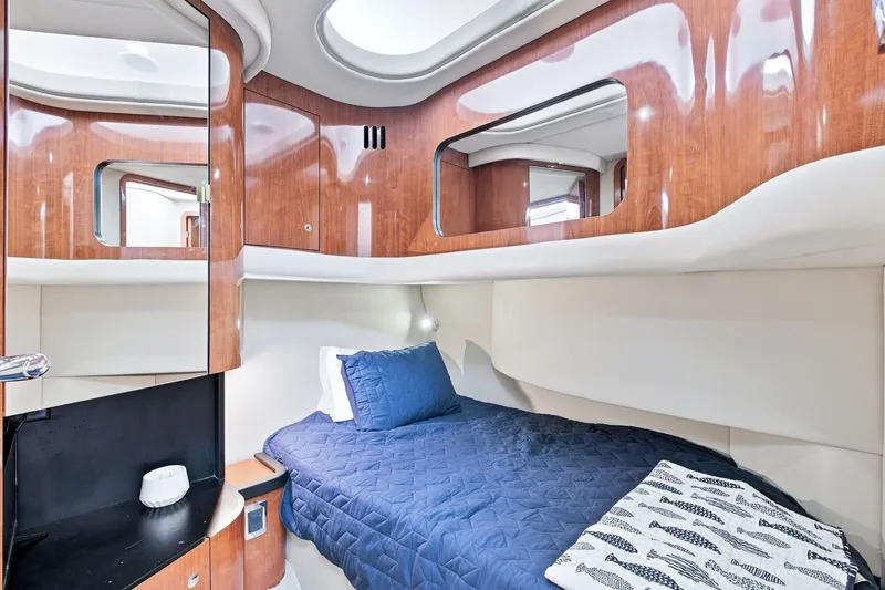 Slide: The Image of Luxurious cabin interior of 2003 Sea Ray 450 Express Bridge yacht. - 67
