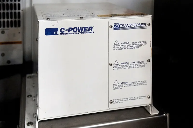 Slide: The Image of C-Power marine isolation transformer on a 2003 Sea Ray 450 Express Bridge. - 79