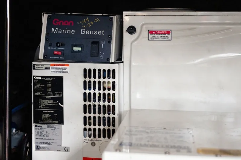 Slide: The Image of Onan marine generator in a 2003 Sea Ray 450 Express Bridge yacht. - 85