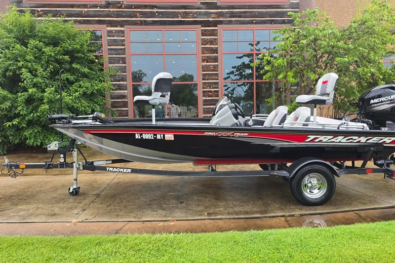 The Image of 2017 Tracker Pro Team 175 TXW boat on trailer, parked outdoors. - 0