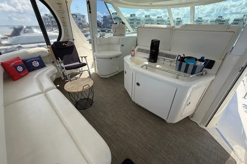 Slide: The Image of Interior of 2007 Sea Ray 40 Motor Yacht with seating and kitchenette. - 27