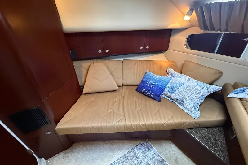 Slide: The Image of Interior of 2007 Sea Ray 40 Motor Yacht with cozy seating and decorative pillows. - 78