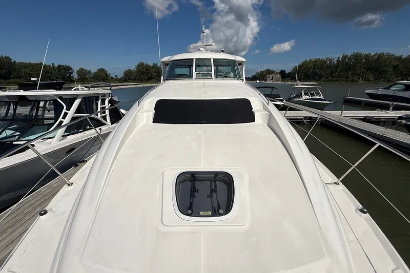 Slide: The Image of 2007 Sea Ray 40 Motor Yacht docked at marina under clear sky. - 20