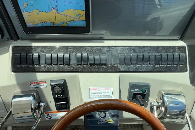 Slide: The Image of Control panel of a 2007 Sea Ray 40 Motor Yacht with navigation screen. - 48
