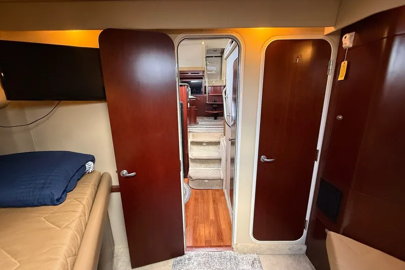 Slide: The Image of Interior of 2007 Sea Ray 40 Motor Yacht with wood finishes and cozy cabin. - 82