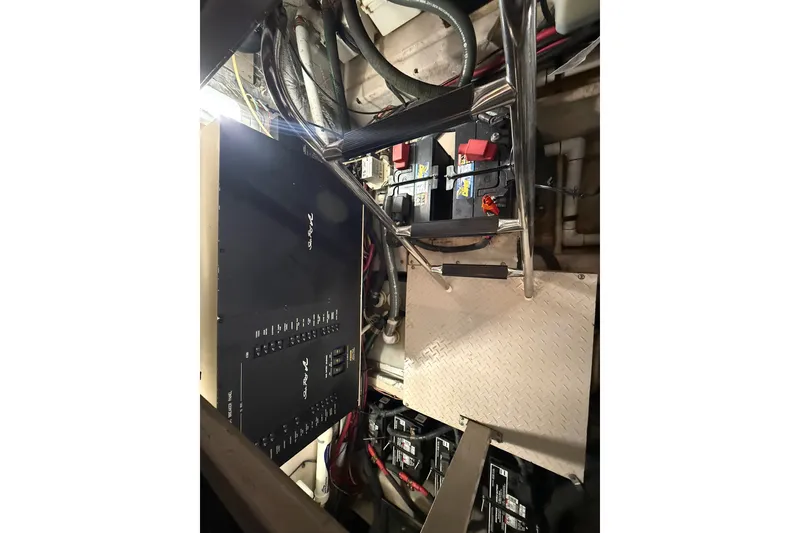 Slide: The Image of Engine room of 2007 Sea Ray 40 Motor Yacht with electrical panel and batteries. - 97