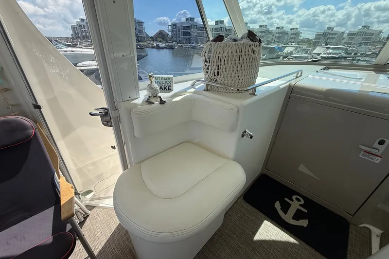 Slide: The Image of Interior of 2007 Sea Ray 40 Motor Yacht with seating and marina view. - 37