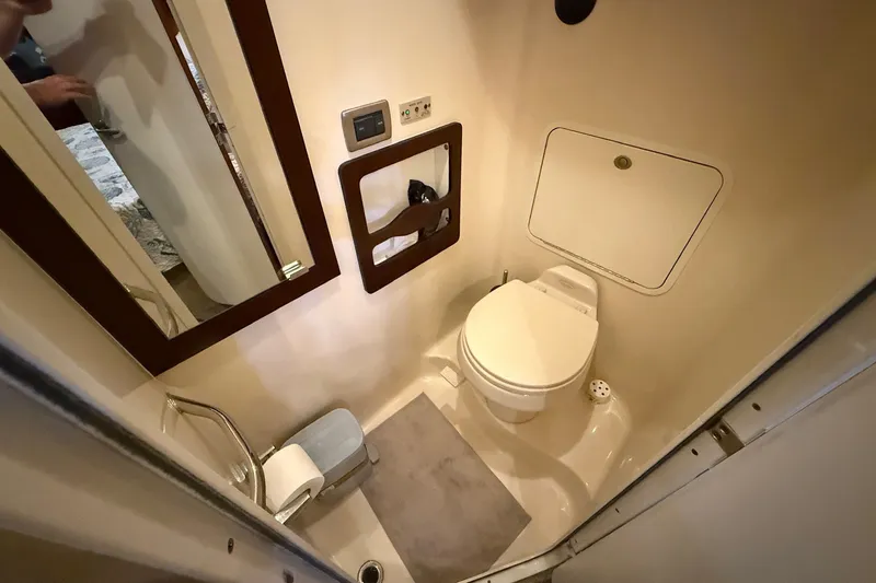 Slide: The Image of Bathroom interior of 2007 Sea Ray 40 Motor Yacht with toilet and mirror. - 94