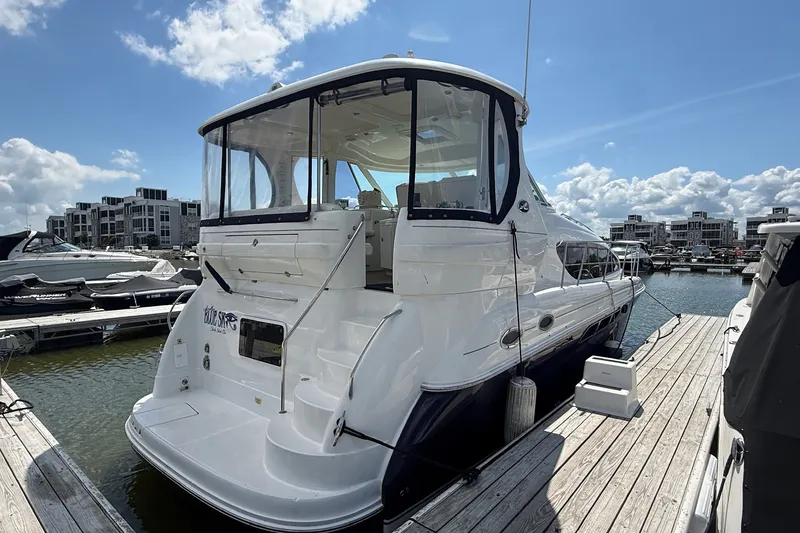 Slide: The Image of 2007 Sea Ray 40 Motor Yacht docked at marina under blue sky. - 5