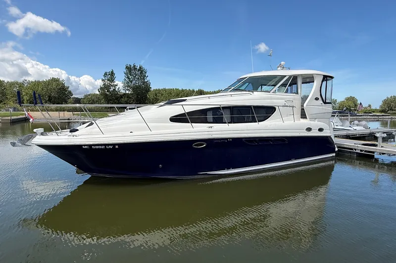 Slide: The Image of 2007 Sea Ray 40 Motor Yacht docked on a sunny day. - 120