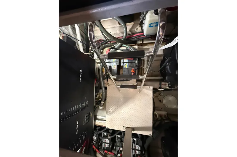Slide: The Image of Engine room of 2007 Sea Ray 40 Motor Yacht with ladder and electrical panel. - 96