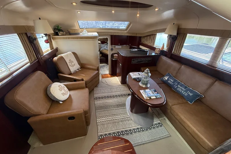Slide: The Image of Luxurious interior of a 2007 Sea Ray 40 Motor Yacht with cozy seating and elegant decor. - 53