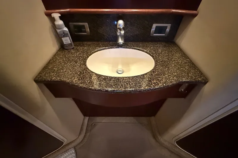 Slide: The Image of Luxurious granite sink area in 2007 Sea Ray 40 Motor Yacht bathroom. - 91